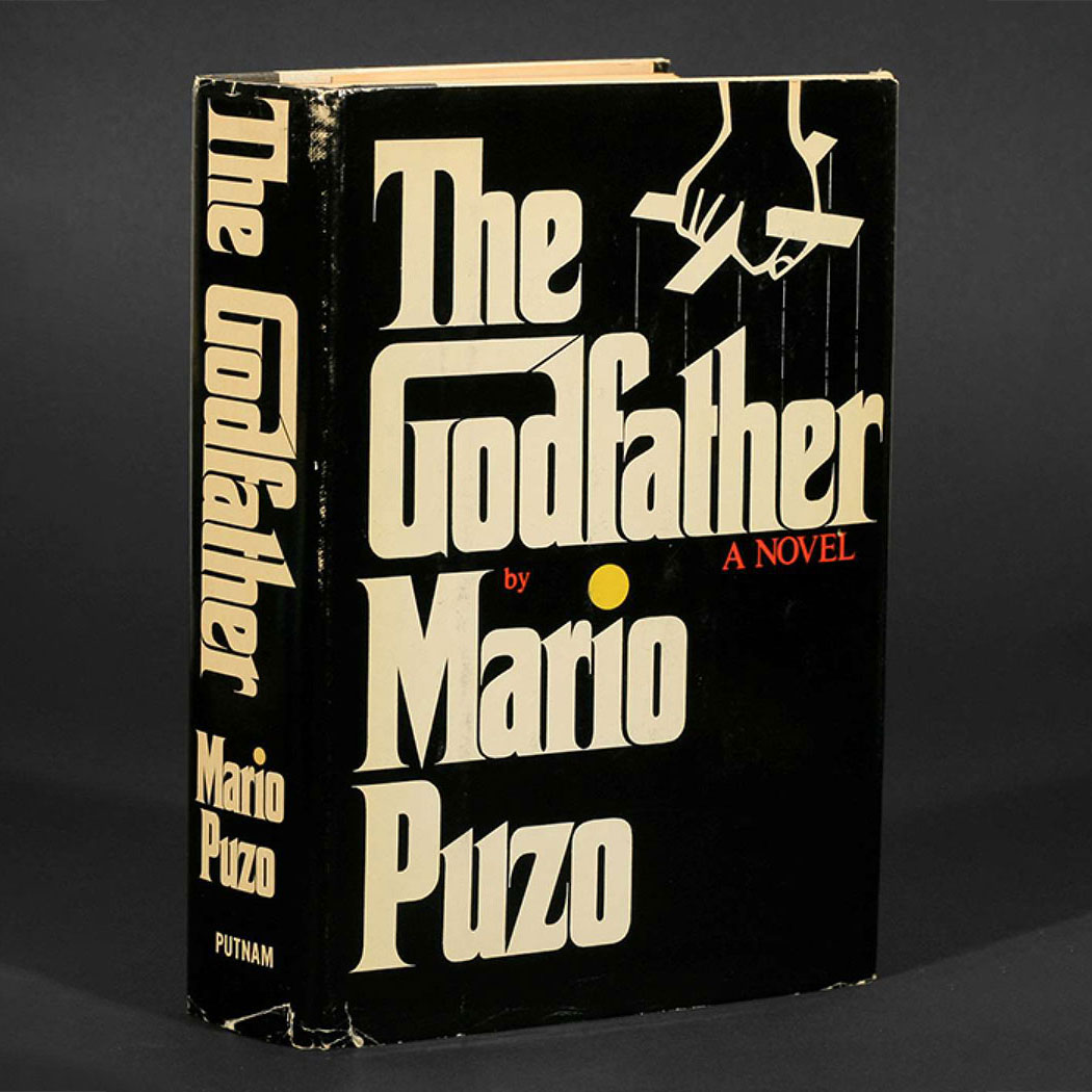 The book, 'the Godfather' standing in gray background.